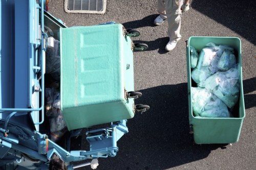Trucks loading items for office clearance transport